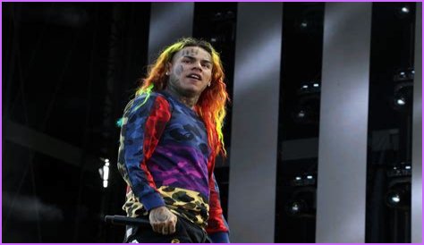 6ix9ine Jeered By Large Crowd While Being Arrested In The Dominican Republic, Mugshot Surfaces Online